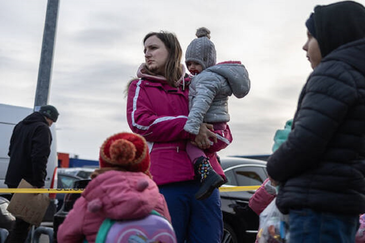 profughi ucraini al confine polacco 
